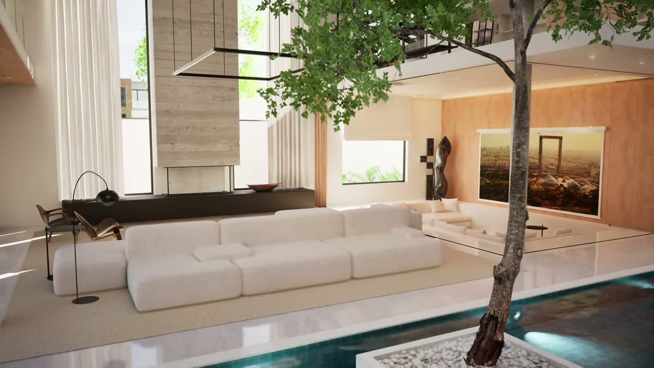 Living room of the sample villa with rug and artwork